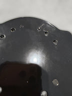 Close-up of the broken tap in the top plate of the blemished Evolver Deep Drop Mount