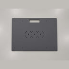 Top of the Travel Platform showing the dock mounting hole pattern and carry handle cutout