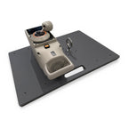 Gray Travel Platform with a Beyond Power VOLTRA I docked and a lifting eye installed, on a white background